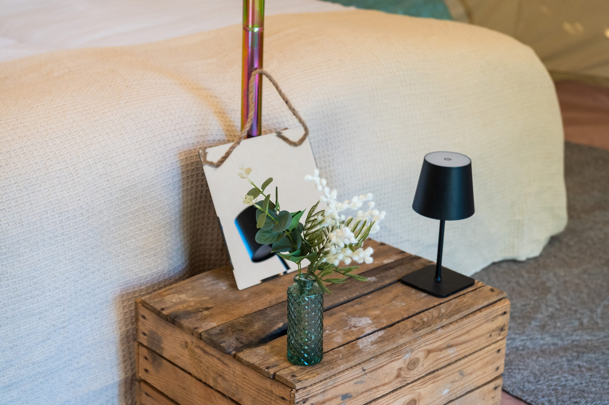 Luxury bell tent interior - rugs, cushions, dried flowers